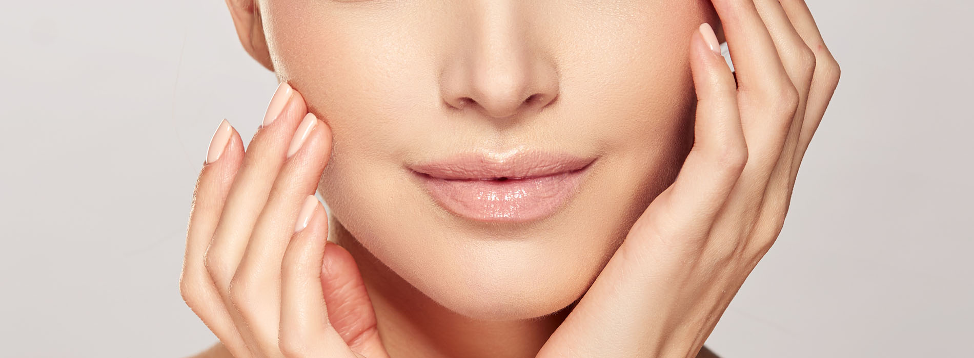 The image shows a close-up of a person s face with a focus on their eyes and nose, set against a white background.